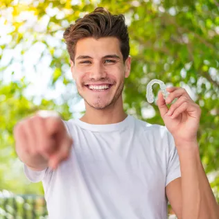 Happy patient with healthy smile